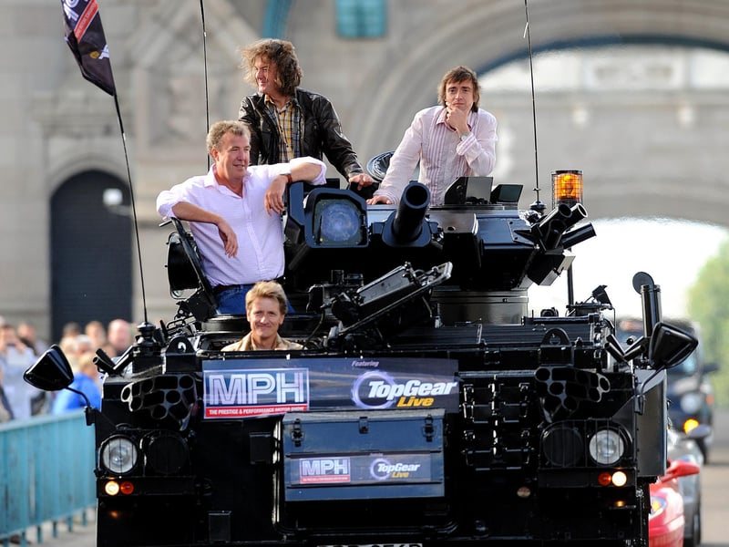 Top Gear presenters (left to right) Jeremy Clarkson, James May and Richard Hammond, are driven across Tower Bridge in a stretched (two welded together) 434 Armoured Personel Carrier in 2008. Picture: Fiona Hanson/PA Wire