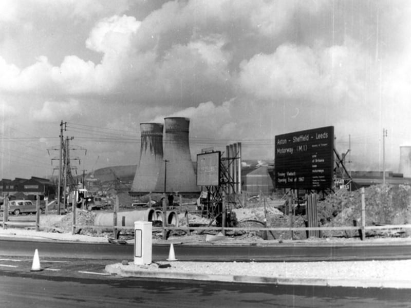 The Tinsley cooling towers, pictured in the background during the construction of the Tinsley Viaduct, pictured in March 1966. Built in 1938 to help meet growing demand for electricity in Sheffield, the towers stood for 70 years before they were demolished in 2008.