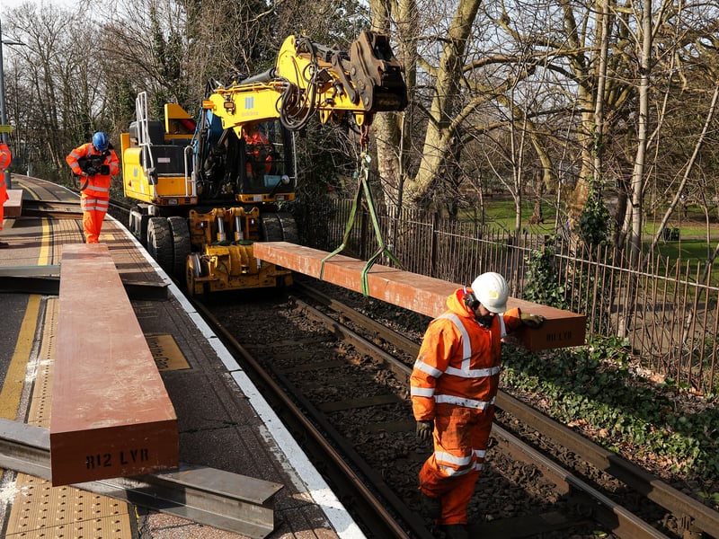 Giant pieces of Japanese-made artificial wood are craned into place, to sit beneath the new steel rails. It is part of major works on the upper railway lines at Portsmouth & Southsea station during February half-term
Picture: Chris Moorhouse (180225-25)