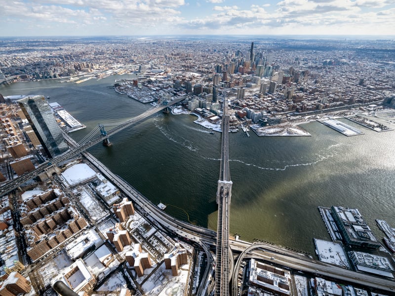 A high-flying photographer has captured the New York covered in snow
