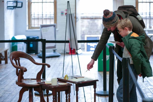 Anthony Brems and his son, Benjamin, 6, at the scene of the crime. Mystery at Fort Nelson where junior detectives attempt to solve a crime during half-term
Picture: Chris Moorhouse (180225-52)