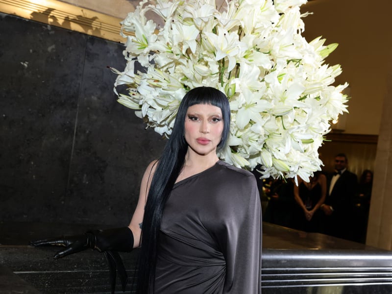 Equally accomplished as a singer and an actress, Lady Gaga is the first woman to win an Academy Award, BAFTA Award, Golden Globe Award and Grammy Award in a single year. Her five studio albums have all reached the top of the Billboard charts, and she is the only female artist to have sold more than one million copies of four different singles. Her estimated 170 million global record sales have helped her amass a fortune of around $300 million.