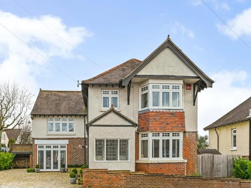 This home comes with four bedrooms, two bathrooms and four reception rooms.