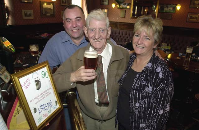 Enjoy these photo memories of pubs we have loved and lost in Pudsey and Stanningley. Pictured is Tommy Spurr standing in the same place as he had done for the last 72 years in October 2003 at the now-closed White Cross with landlord Colm and Sue O'Neill.