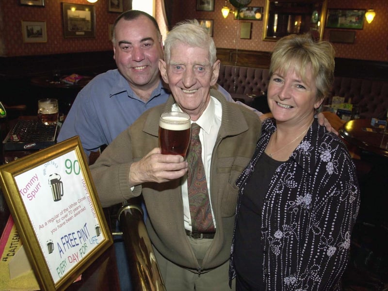 Enjoy these photo memories of pubs we have loved and lost in Pudsey and Stanningley. Pictured is Tommy Spurr standing in the same place as he had done for the last 72 years in October 2003 at the now-closed White Cross with landlord Colm and Sue O'Neill.