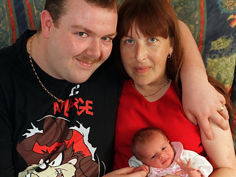 Mark and Elaine Hogan from Kippax are pictured with their baby Aleisha. She was delivered by Mr Hogan when his wife suddenly started giving birth at home. Pictured in August 1997.