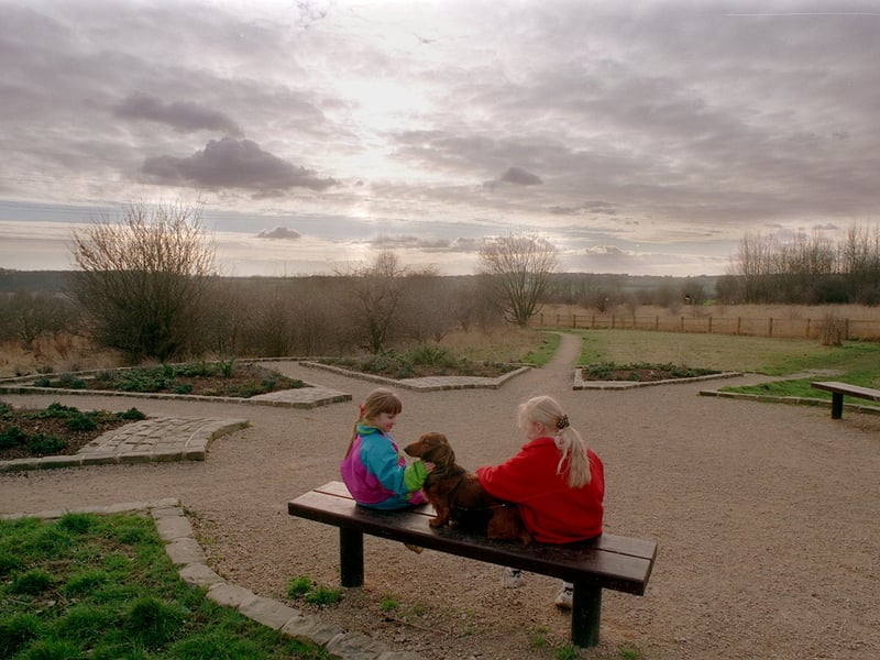 Two local children enjoy the award-winning Kippax Park in February 1999. The 19 acre site has been transformed using local unemployed people.