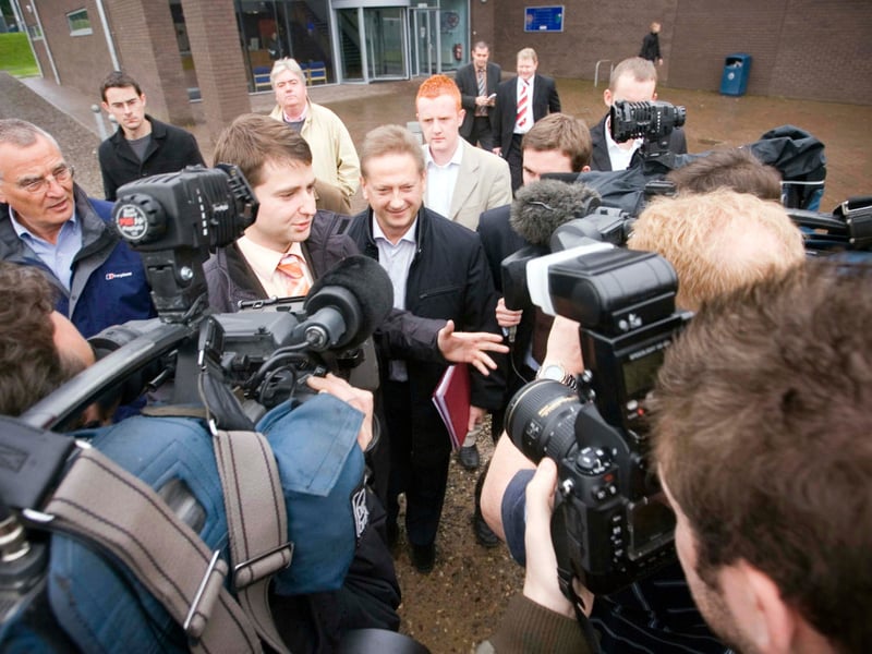 Owner Romanov is met by a barrage of media after a statement read out by the Hearts players. Cracks were beginning to show.