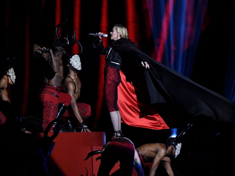 In 2015, Madonna took to the stage to perform 'Living for Love' in what would be her first BRITs performance in 20 years. Decked out in a Spanish matador's outfit, the American pop star wore a large, draped cape that was set to be whisked off her at one point during the performance. However, malfunction with the tie saw the singer go flying as her dancers, unaware that she was still wearing the cape, pulled her from the top of a flight of stairs. The moment shocked viewers, who watched and heard the moment the singer crashed to ground. However, like a professional, Madonna got right back up and continued performing, singing the lines: "Took me to heaven and let me fall down/Now that it's over/I'm gonna carry on/Lifted me up, and watched me stumble/After the heartache/I'm gonna carry on"