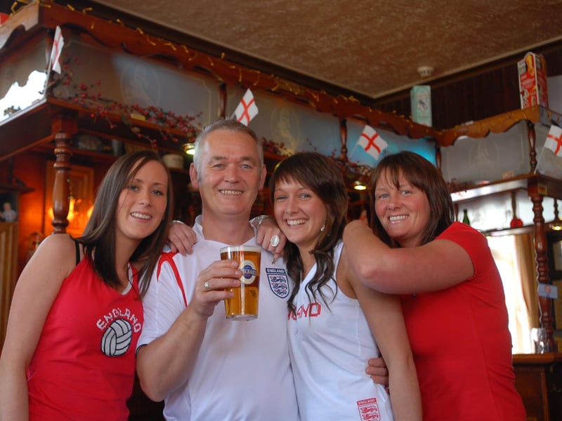 Sara Belk, Amie Fawcett and Liz Fawcett joined Trevor for this World Cup themed photo in 2006.