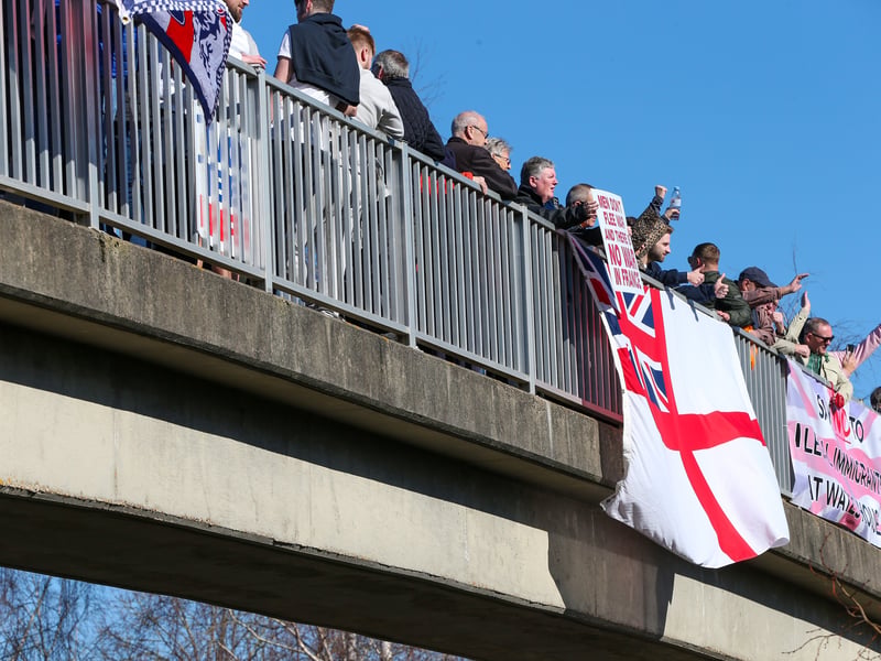 Protesters on the footbridge over Wallington Way, Fareham near Wates House against plans for homes in Fareham to be used for asylum seekers
Picture: Chris Moorhouse (010325-40)
