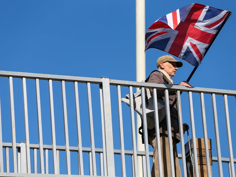 Protestor on the footbridge over Wallington Way, Fareham near Wates House
Picture: Chris Moorhouse (010325-39)