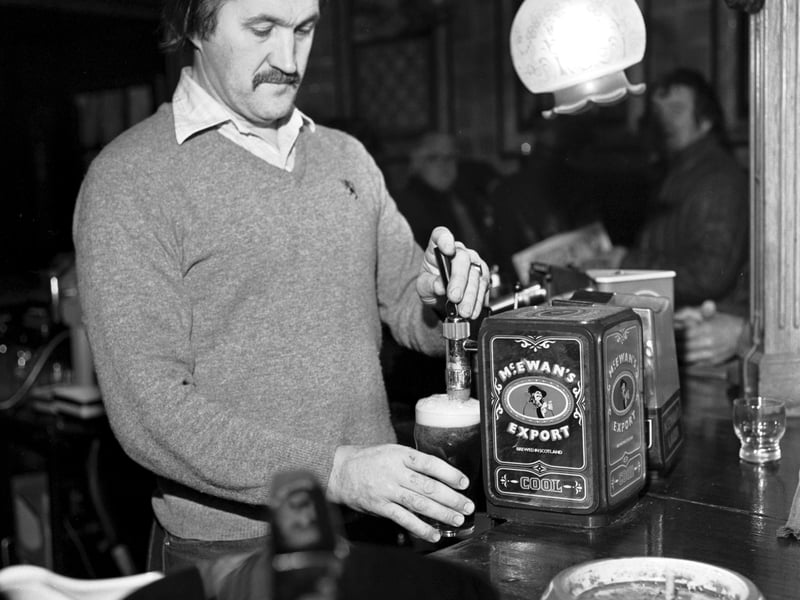 Barman Ian Boswell pulls an early morning pint of beer at the Central bar in Leith, November 1981 following the introduction of early morning opening hours