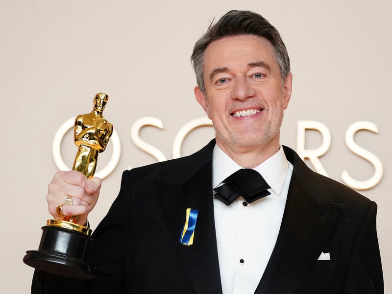 Peter Straughan, winner of the award for best adapted screenplay for 'Conclave', poses in the press room at the Oscars. On stage, British writer Straughan thanked fellow writer Robert Harris, who wrote the original novel, for his “beautiful book”, saying “we’re all standing on your shoulders” and also paid tribute to producer Tessa Ross and director Edward Berger.
