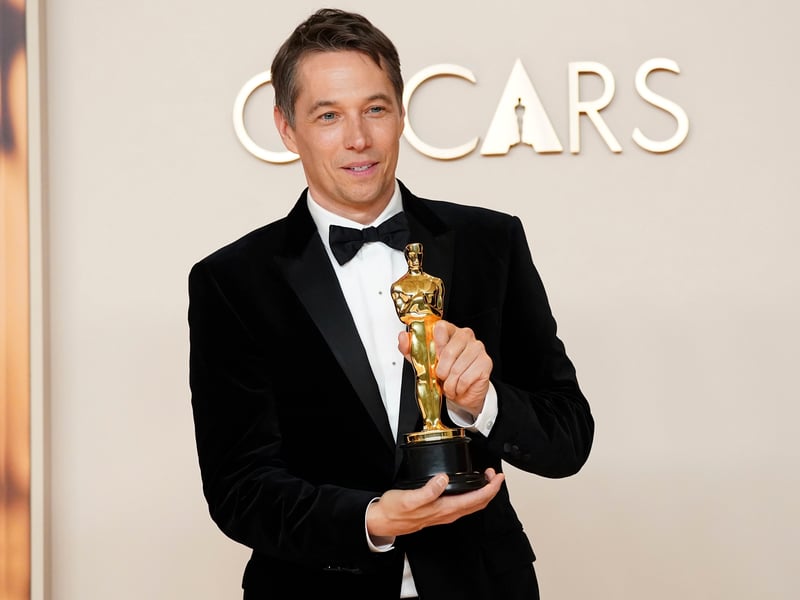 Sean Baker, winner of the award for best director for 'Anora', poses in the press room at the Oscars. Anora scooped a high for the night of five wins from six overall nominations.