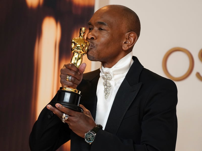 Paul Tazewell, winner of the award for best costume design for 'Wicked', poses in the press room at the Oscars. The American film costumer designer who created the outfits for The Wizard Of Oz prequel said he was “the first black man” to have received the prize, and thanked “everyone in the UK”, who helped on the musical production as he received a standing ovation from the attendees.