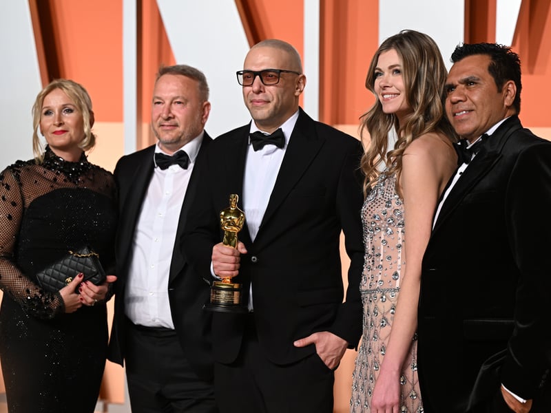 Iranian animator Hossein Molayemi (centre) holds the Oscar for Best Animated Short Film for "In the Shadow of the Cypress" as he attends the Vanity Fair Oscar Party. Other winners on the night were I'm Still Here as Best International Feature, Flow as Best Animated Feature, Anora for Best Original Screenplay, El Mal (Emilia Pérez) as Best Original Song, The Brutalist for Best Original Score and No Other Land as Best Documentary Feature. Rounding out the Oscar winners was The Substance for Best Make-Up and Hair Styling, Anora for Best Film Editing, The Brutalist for Best Cinematography, Dune: Part Two for Best Visual Effects and I'm Not a Robot as Best Live Action Short. The Only Girl in the Orchestra was crowned Best Documentary Short