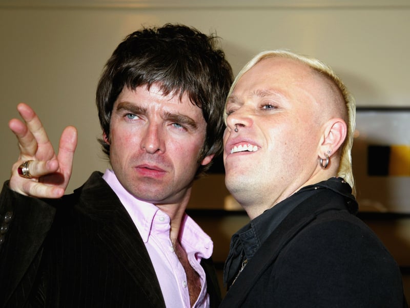 Noel Gallagher and Keith Flint pose in the awards room after Oasis win the Peoples Choice and Best Album award for "Don't Believe The Truth", and The Prodigy win the Q Innovation In Sound award at The Q Awards, the annual magazine's music awards, at Grosvenor House on October 10, 2005 in London, England.