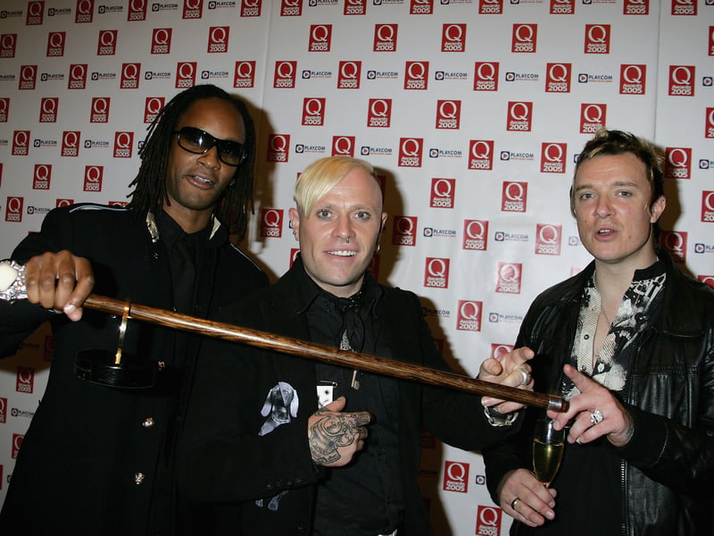 Maxim Reality, Keith Flint and Liam Howlett of The Prodigy pose in the awards room with the Q Innovation In Sound award at The Q Awards, the annual magazine's music awards, at Grosvenor House on October 10, 2005 in London, England.