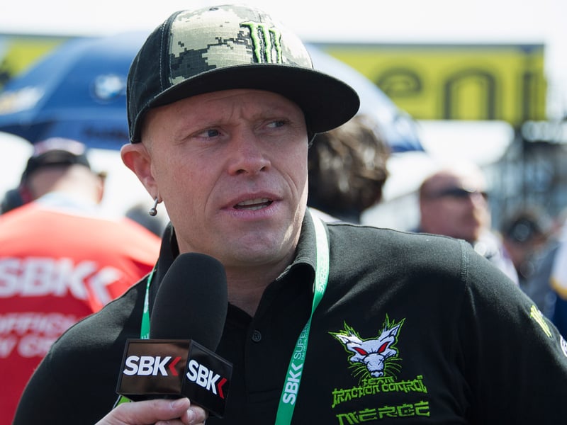 Musician Keith Flint speaks with journalists on the grid during the race 1 of the World Superbikes - Race during the round five of 2013 Superbikes FIM World Championship at Donington Park on May 26, 2013 in Castle Donington, England.