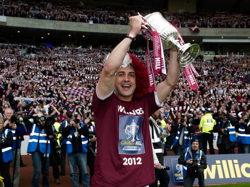 Hearts' Rudi Skacel celebrates with the William Hill Scottish Cup trophy.