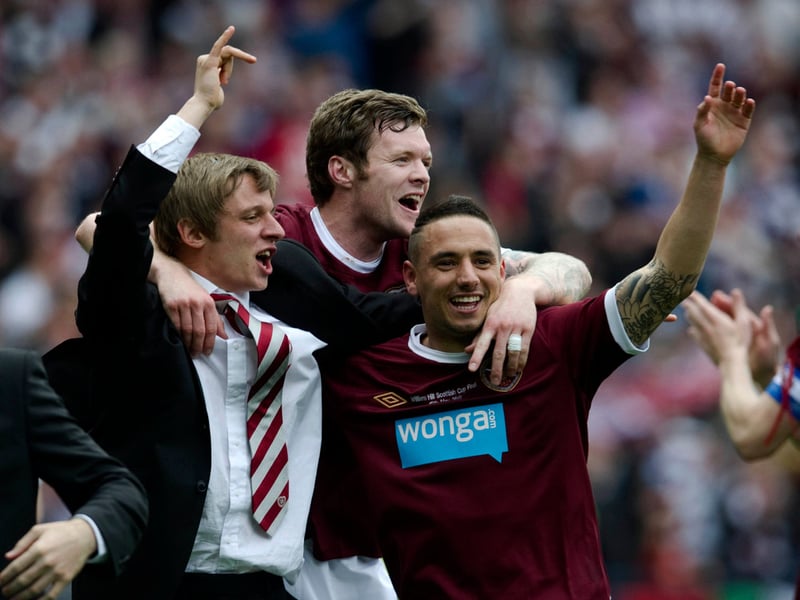 Hearts trio Arvydas Novikovas, Darren Barr and Suso Santana celebrate after the final whistle.