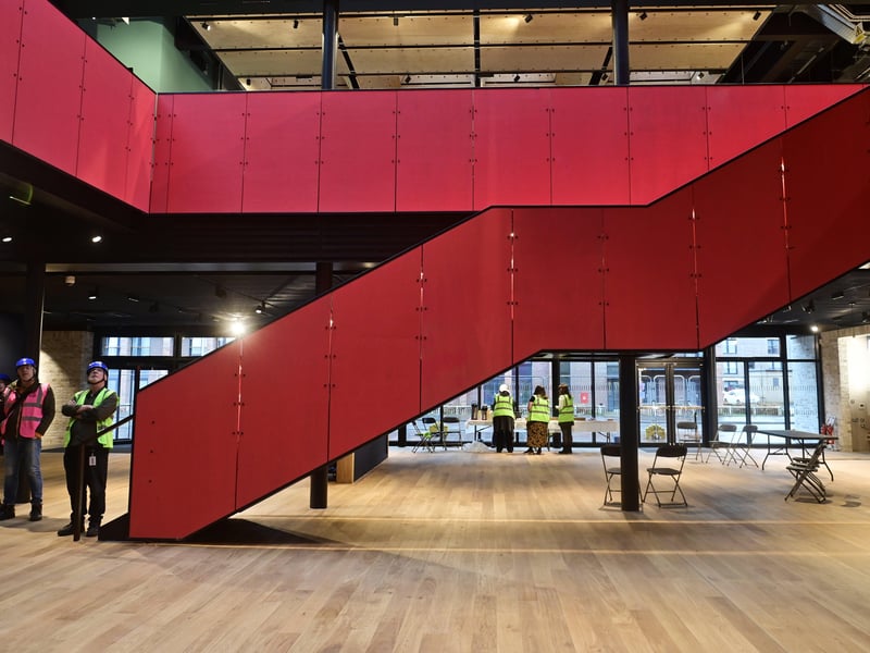 The glass foyer is on one level for accessibility.