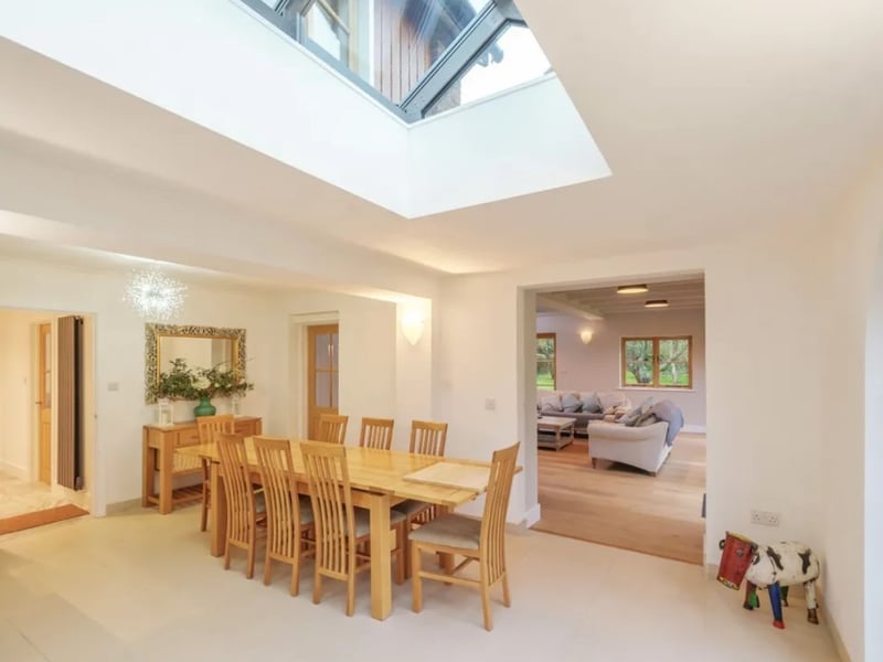 The listing says: "Originally built in 1962, this individual property has been thoughtfully updated throughout by our clients over the last few years, blending contemporary style with its charming original features whilst incorporating the important aspects of Feng Shui." 