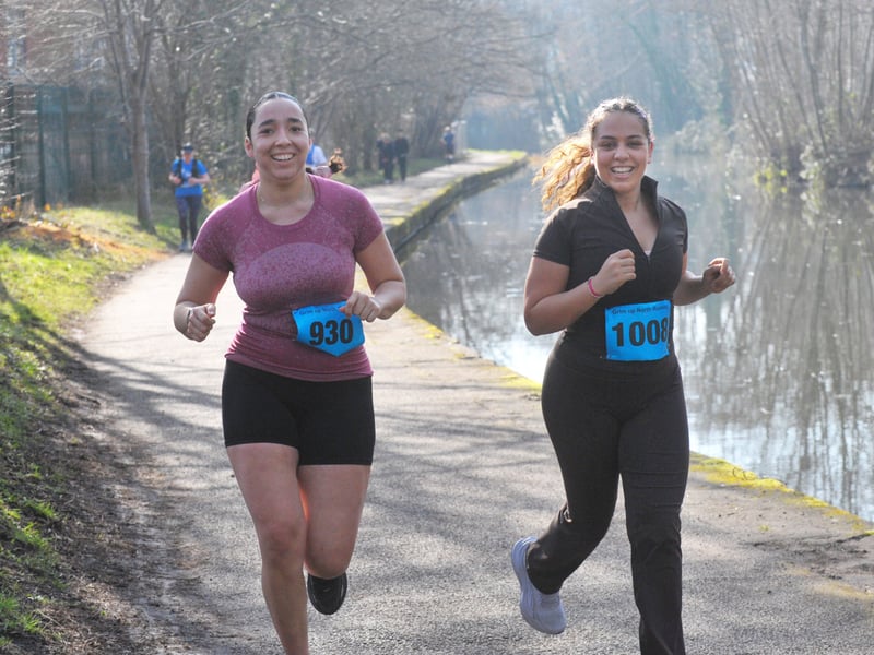 Happy with the morning sun are runners Amelia Ikwue and Grace Hudson.