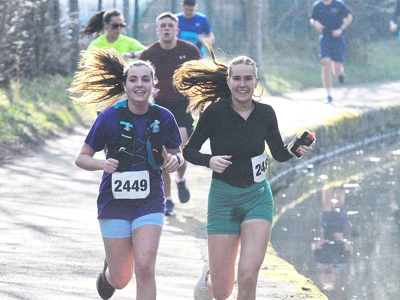Runners in the morning sun.