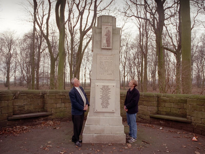 Local resident and organiser Carl Wise, right, and Coun Malcolm Bedford admire a new plaque on Farnley's war memorial in December 1999.