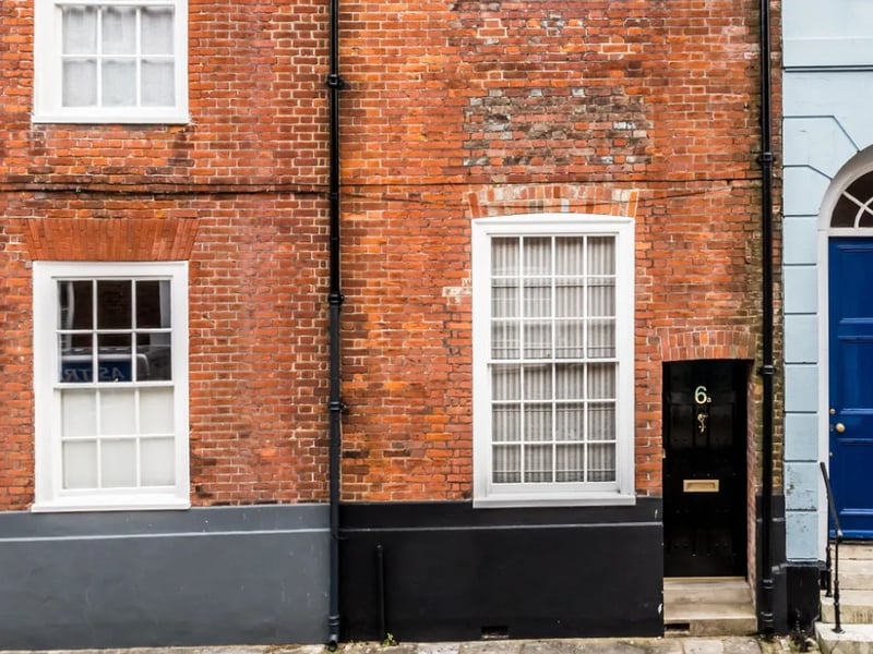 Behind this tiny door, is an absolutely phenomenal home that is the epitome of quirkiness.