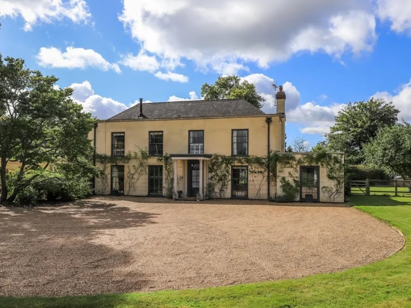 This home comes with seven bedrooms, five bathrooms and four reception rooms. 