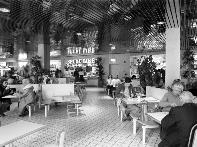 Baked potato shop Spud U Like anf the food court of the newly-opened Cameron Toll shopping centre in Edinburgh, April 1985.