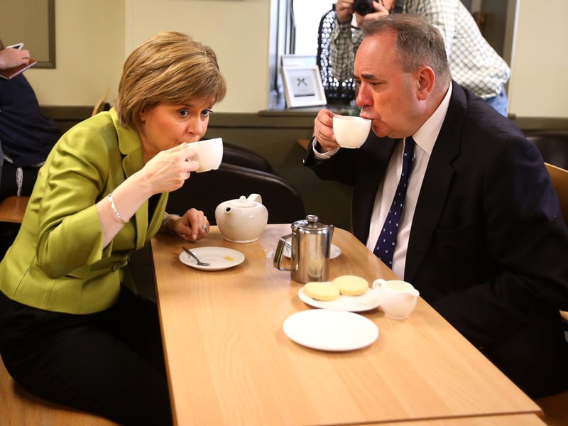 Nicola Sturgeon enjoys a cup of tea with Alex Salmond while on the general election campaign trail in Inverurie in the Gordon constituency in 2015.