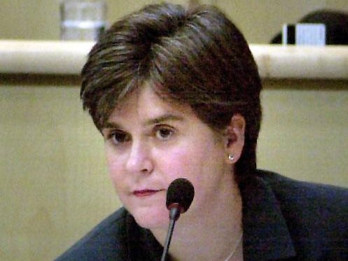 SNP shadow education minister Nicola Sturgeon listening to Sam Galbraith's statement on the exam results fiasco, on the first day of the Scottish Parliament in Edinburgh in 2004