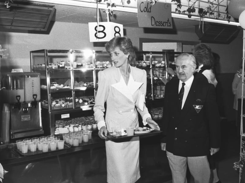 Princess Diana with her lunch on a tray during a visit to  the cafeteria at Edinburgh University's Pollock Halls in July 1986.
