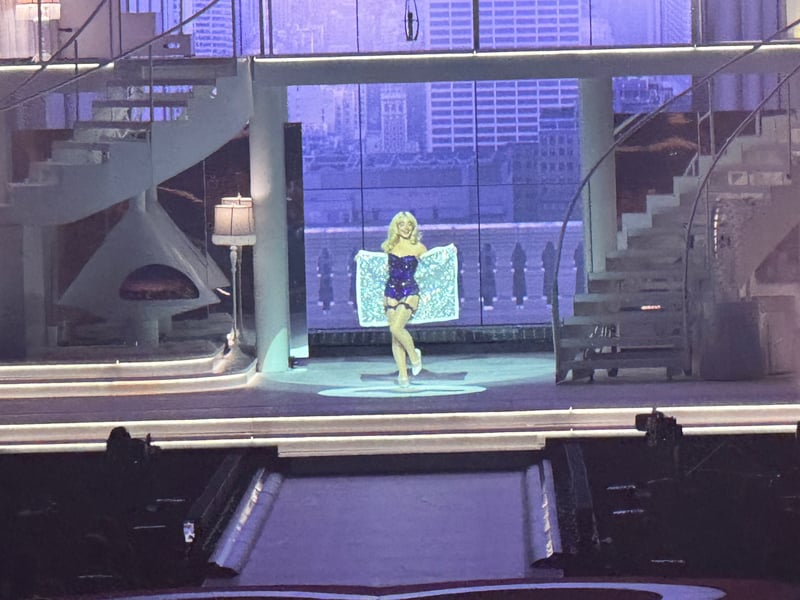 The singer removed her bath towel to reveal a sparkly outfit.