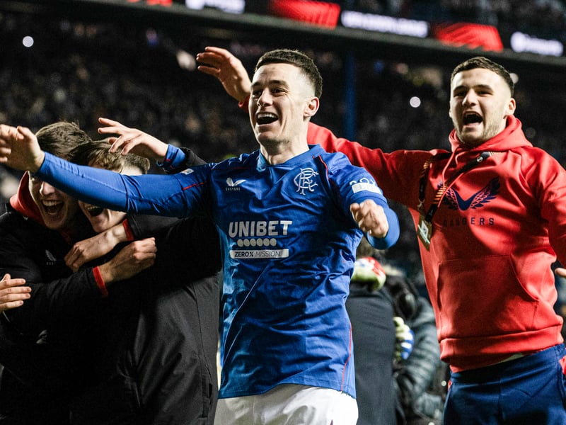 Rangers' Tom Lawrence and Mason Munn (R) celebrate at full time.