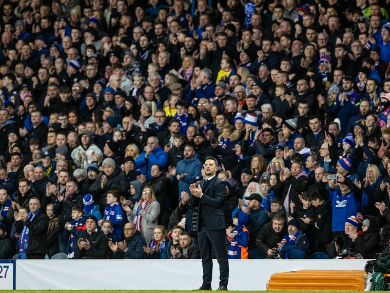 Rangers interim head coach Barry Ferguson joins in the fans during the minutes applause for Rangers fan Christopher Potter.