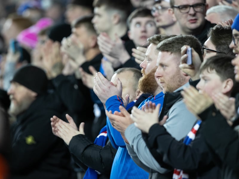 Rangers fans hold a minutes applause in the 40th minute in memory of Rangers fan Christopher Potter.