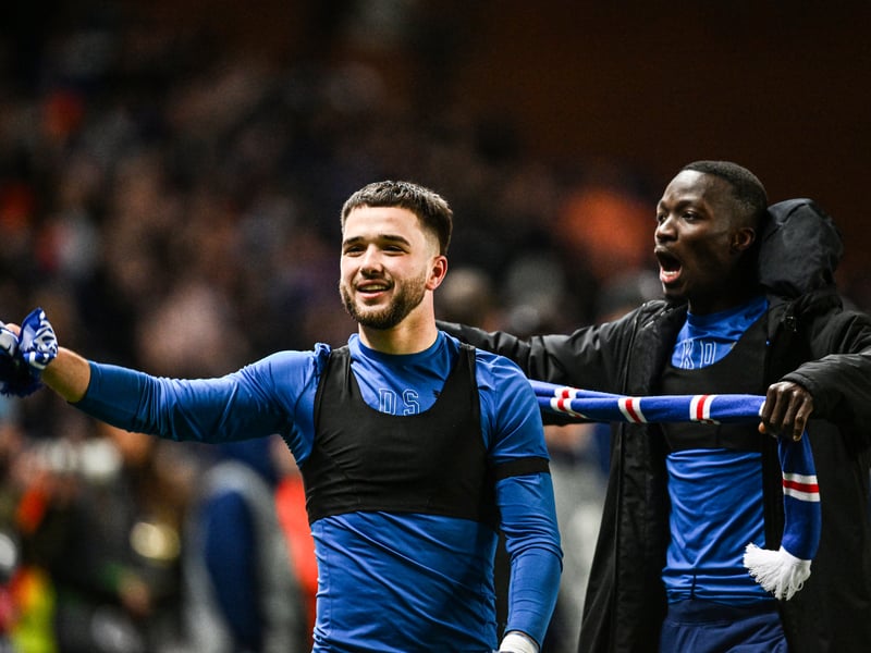 Nicolas Raskin and Mohamed Diomande with Rangers scarves at full time.