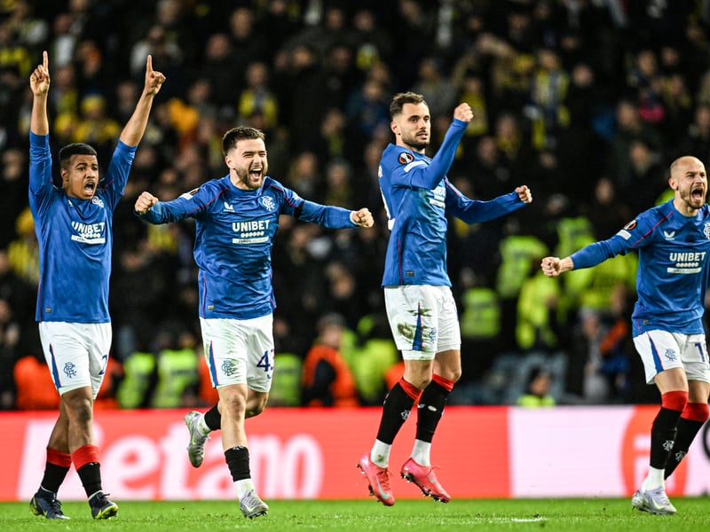 Rangers' Hamza Igamane, Nedim Bajrami, Nicolas Raskin and Vaclav Cerny celebrate as Jack Butland saves the penalty of Dusan Tadic.