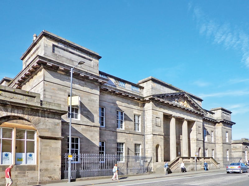 Leith was Scotland’s premier port until it was eclipsed by Glasgow, with this mighty Greek Revival customs house befitting of its status. It was here that captains would declare their cargoes and pay duties with the operation's royal authority stamped with lion and unicorn heraldry in the pediment above the entranceway. 
Vacated in 1980, the building was bought by the City in 2015.
Since 2019 the Scottish Historic Buildings Trust has been working on its conservation and future use for the community, Robin Ward wrote.




