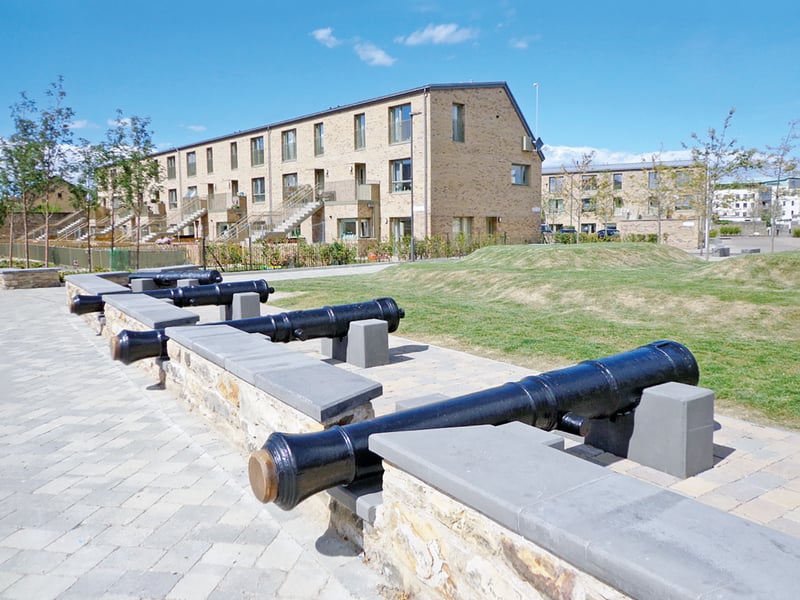 The fort was built to defend Leith after John Paul Jones, the
Scottish-born ‘father’ of the US Navy, led three warships into the Firth of Forth in 1779 during the American War of Independence.
He planned to capture and hold the burgh to ransom, but a storm sabotaged the raid and he sailed away, Robin Ward wrote.
The fort, an army base until 1956, was redeveloped with council housing. This was, demolished in 2012 and replaced by Port of Leith Housing Association, with the homes inspired
by the Victorian ‘colonies’ concept.
The original guardhouses, gateway and stone walls still stand on North Fort Street