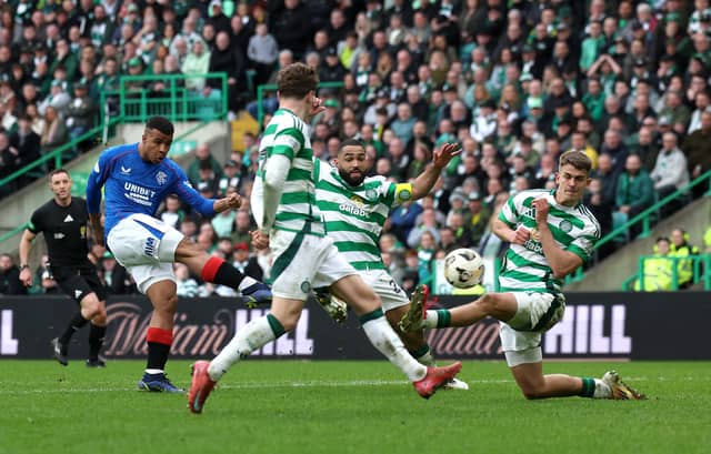 Hamza Igamane of Rangers scores his team's third goal against Celtic in the closing stages