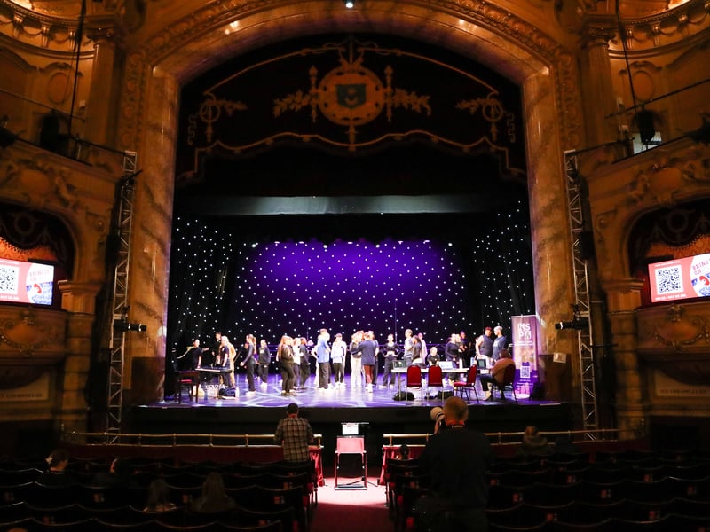 Visitors tour the theatre