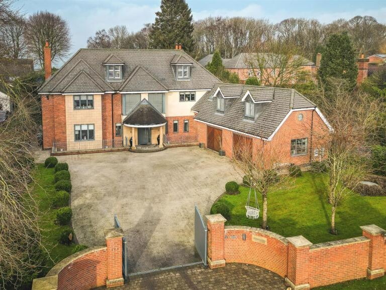 Burley Lane, in Amber Valley, Derbyshire, is the most expensive street in the East Midlands, according to Rightmove, with an average asking price of £1,264,990. This five-bedroom house in the sought-after village of Quarndon boasts a 'magnificent' entrance hall and a 'beautiful' living/kitchen/dining room/snug/kitchen. There's a luxury cinema room with its own bar, two gyms, a shower/steam room, and private landscaped gardens.