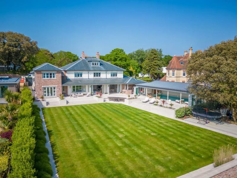 Alington Road, in Poole, is the most expensive street in the South West, according to Rightmove, with an average asking price of £3,403,773. This five-bedroom home boasts 'incredible' views of Poole Harbour and features a huge pool complex. The open-plan kitchen/family room leads via bi-fold doors to the veranda, the huge private sun terrace and the large garden. There's also a play room, a small gym and a private guest suite on the ground floor which would be perfect for friends or relatives.