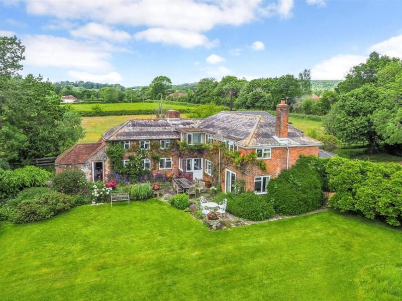 Petersfield in Hampshire is the best place to live in the South East, according to the Sunday Times. Judges called it a 'family-friendly' town with 'excellent' schools, plenty of sporty and artistic pursuits and a 'caring community that looks out for all ages'. This gorgeous four-bedroom detached period cottage is set in grounds of around 2.2 acres and enjoys delightful views over the surrounding countryside.
